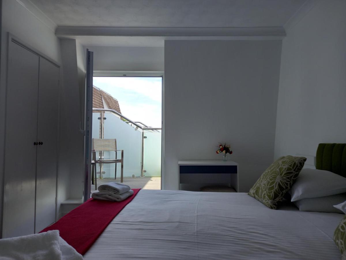 Saints Bay Hotel Bagian luar foto